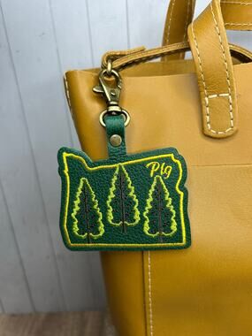 Portland Leather Bag Charm Oregon Purse Charm PNW Oregon Pebbled Gold Stitched